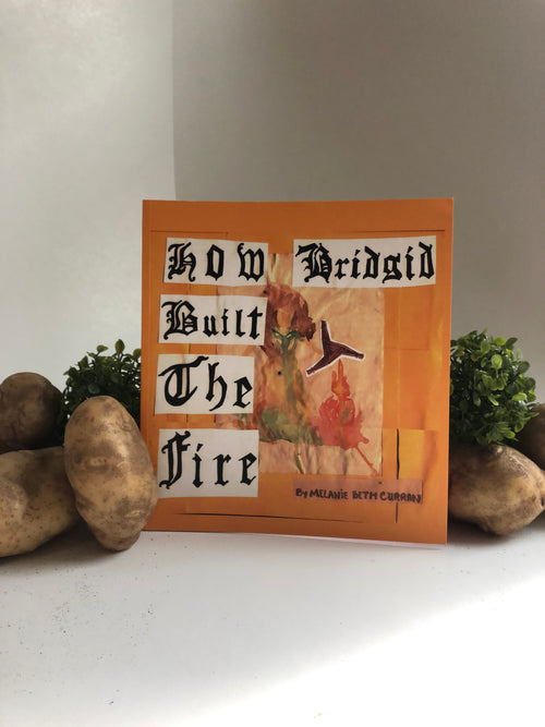 Handmade book with text and graphics on a white background about Brigid